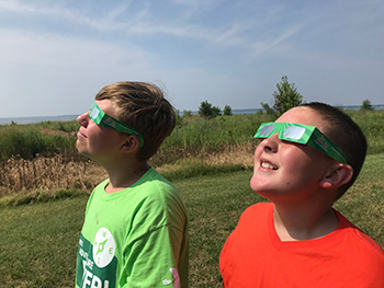 watching the solar eclipse in 2017 at Belle Isle State Park
